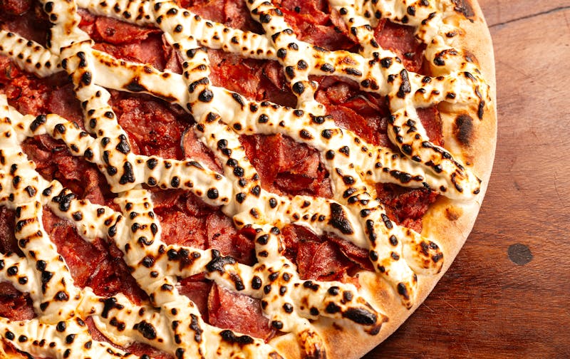 Smoky Ranch Mac Pizza topped with macaroni and cheese